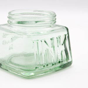 Oversized glass ink pot close up