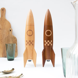 Light and dark wood rocket salt and pepper mills in kitchen