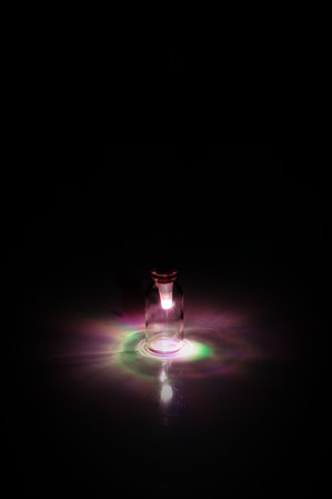 Multi-colour Bottle light by SuckUK - twist to select colour. Shown in glass bottle.