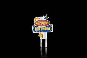 Birthday cake decoration with flashing lights.