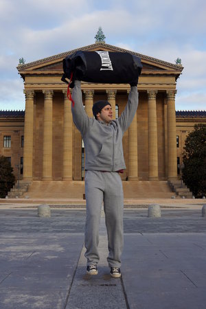 exercising with punching bag at home and outdoors