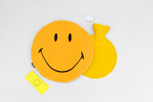 smiley face yellow hot water bottle layout